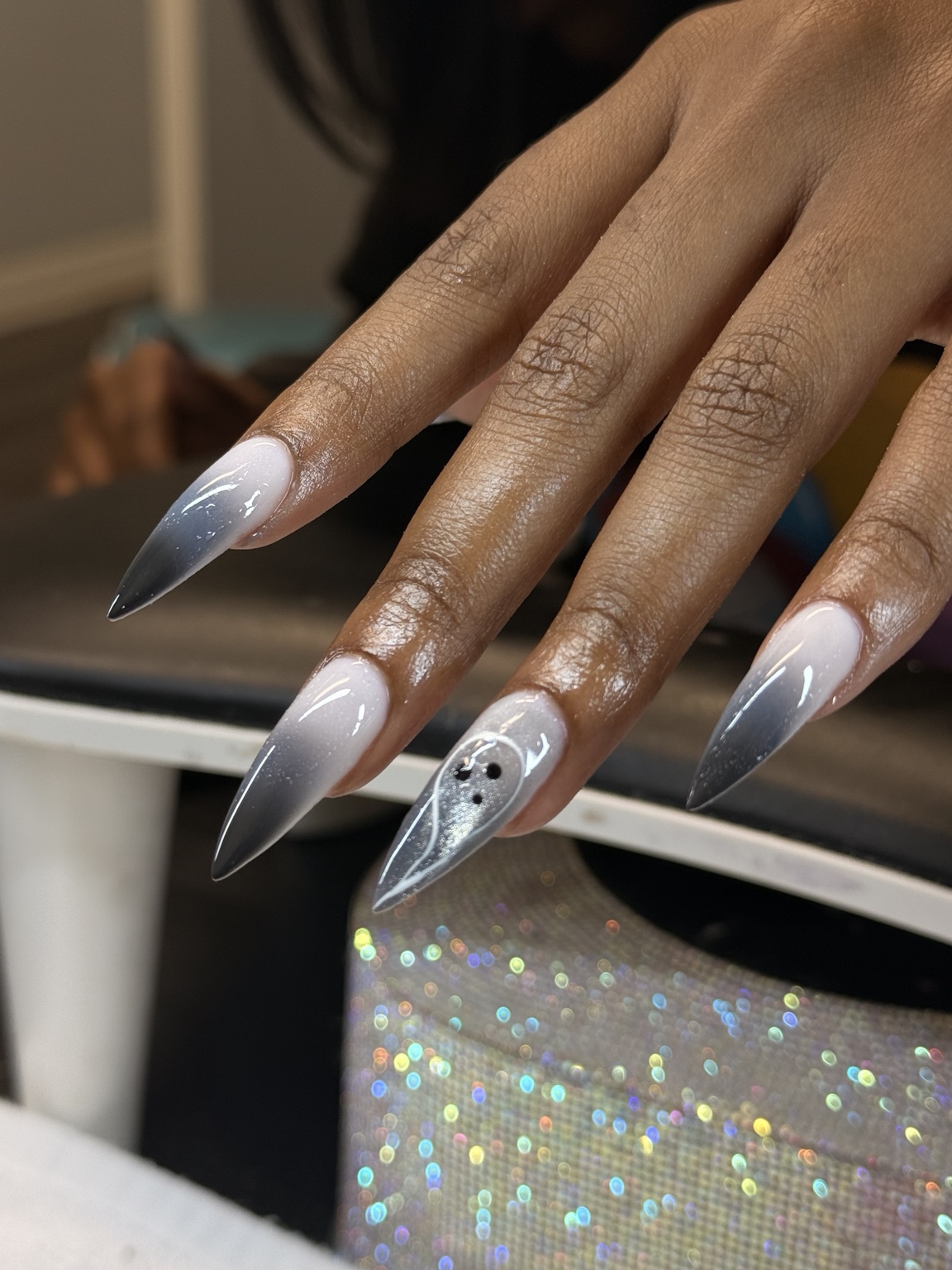 Sculptural grey ombré nail design