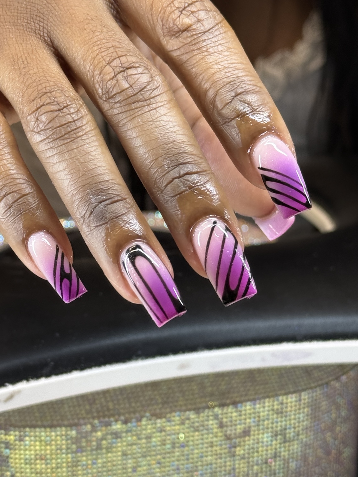 Pink and black graphic manicure